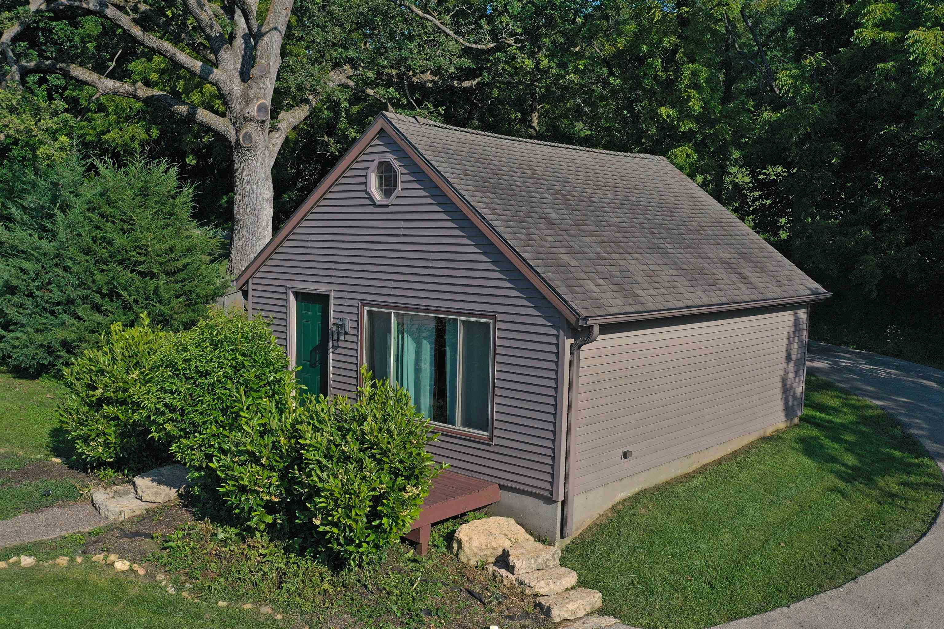 2287 West Hanover Road Hanover, IL 61041 - Photo 26 of 38 a view of a house with a yard and plants