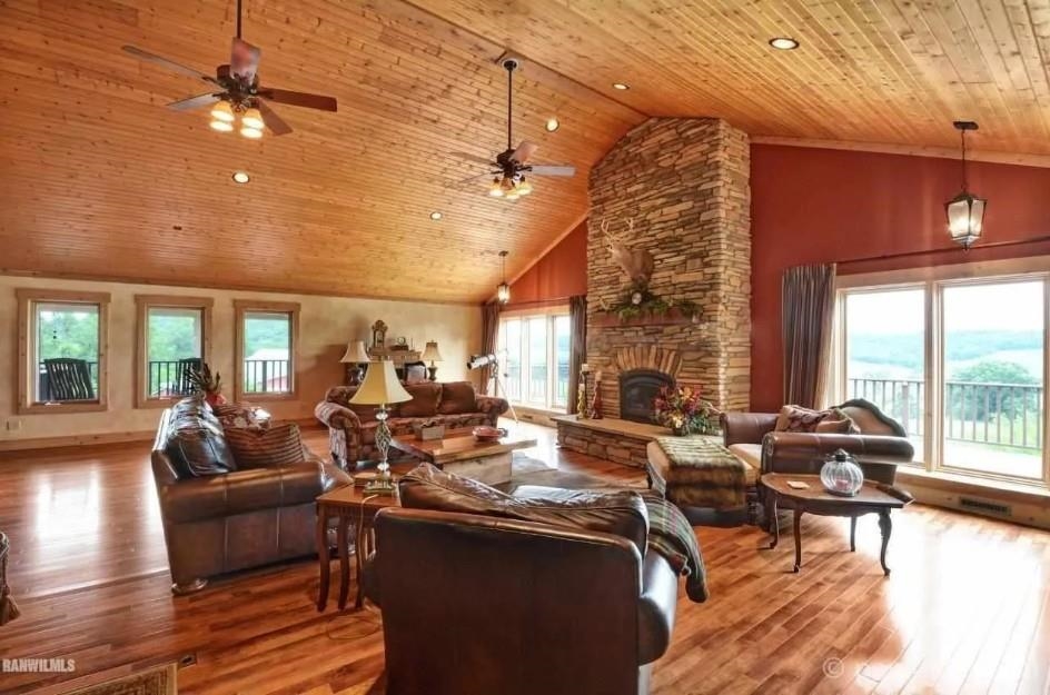 2287 West Hanover Road Hanover, IL 61041 - Photo 5 of 38 a living room with fireplace furniture and a large window
