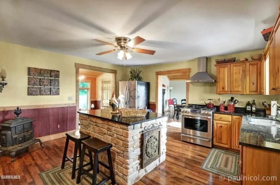 2287 West Hanover Road Hanover, IL 61041 - Photo 8 of 38 a living room with stainless steel appliances granite countertop furniture and a kitchen view