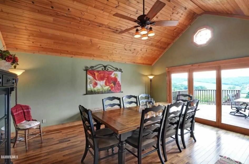 2287 West Hanover Road Hanover, IL 61041 - Photo 10 of 38 a view of a dining room with furniture wooden floor and chandelier