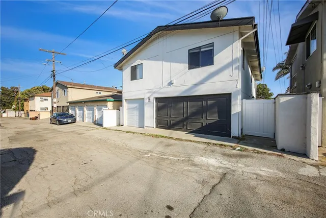 a view of a house with a road