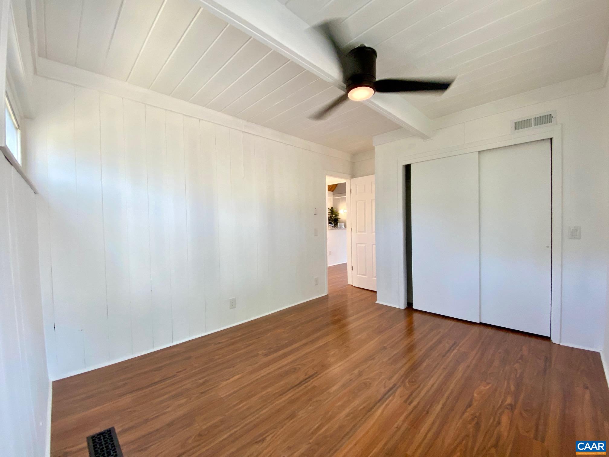 24 Tanglewood Road Palmyra, VA 22963 - Photo 13 of 23 a view of an empty room with wooden floor