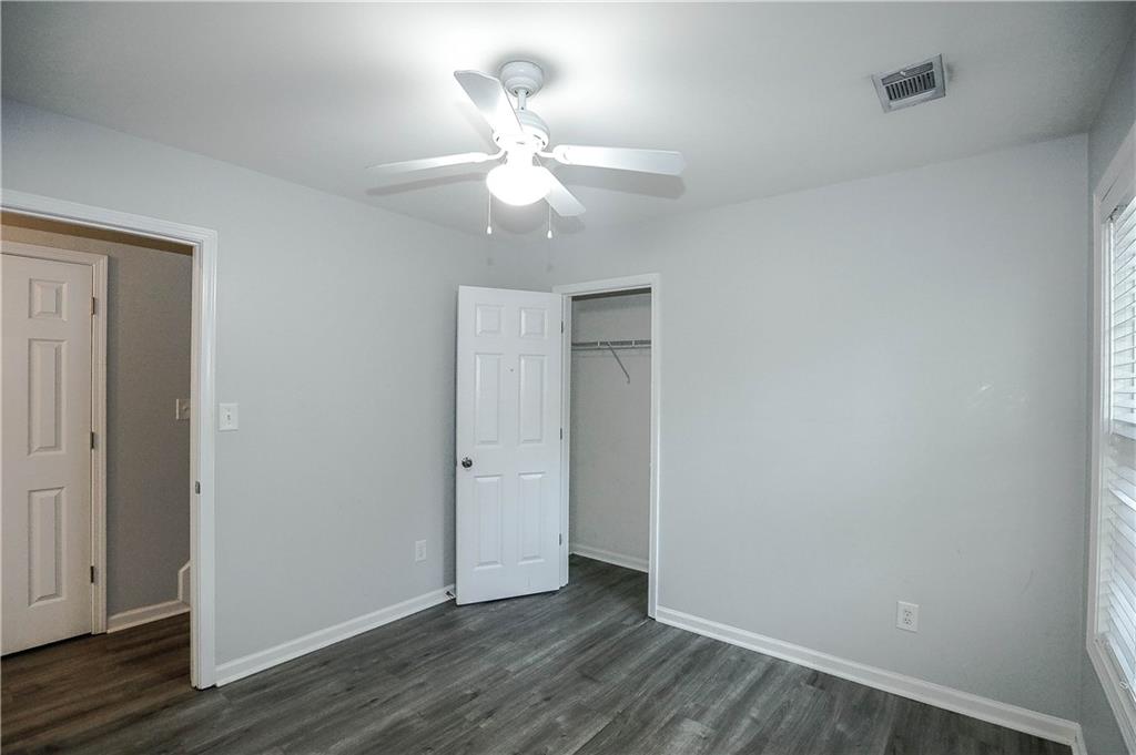 3264 Star Pine Court Duluth, GA 30096 - Photo 38 of 43 a view of an empty room with wooden floor