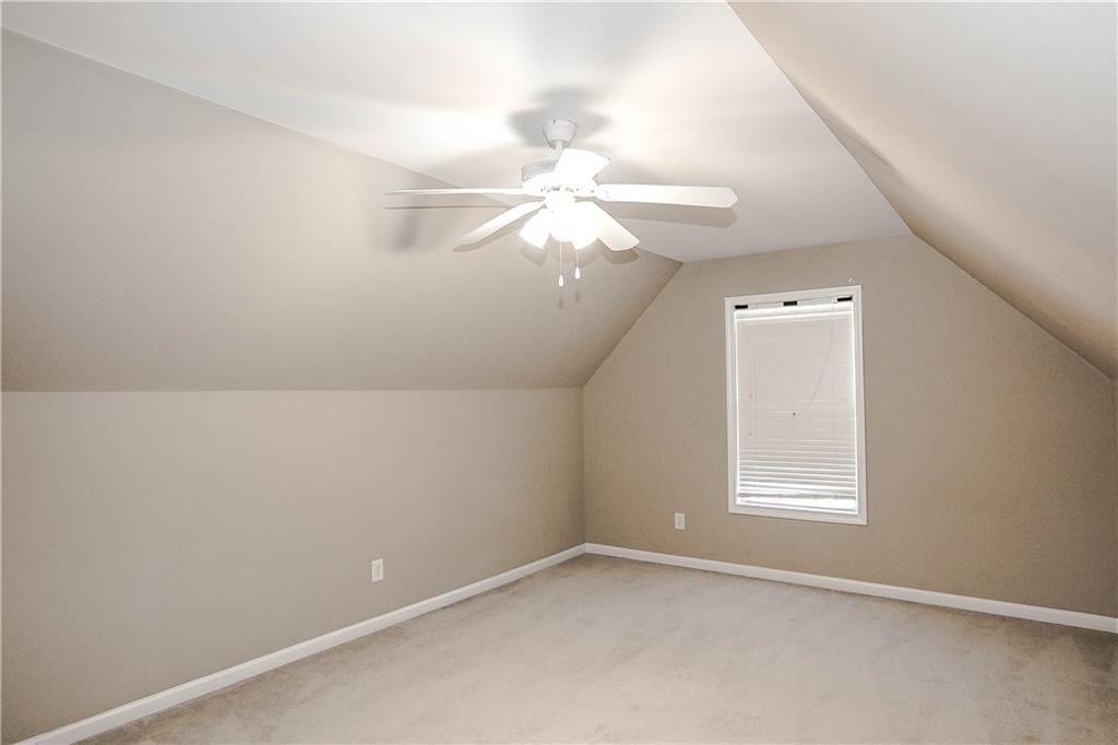 3264 Star Pine Court Duluth, GA 30096 - Photo 41 of 43 an empty room with windows and fan