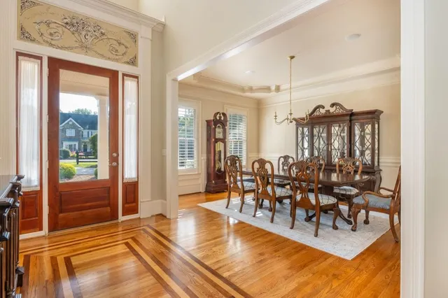 a living room with furniture and windows