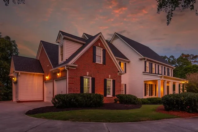 front view of a house with a yard
