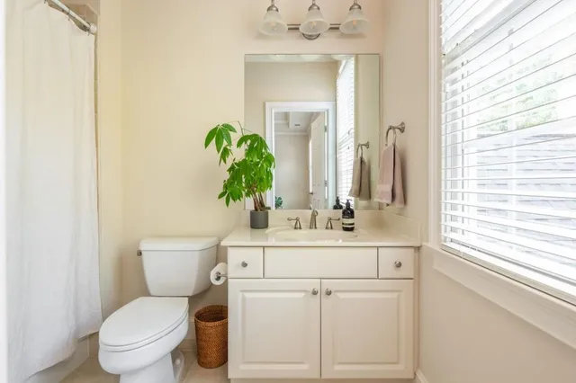 a view of a chairs and table in the patio