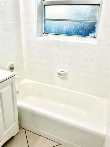 a bathroom with a bathtub