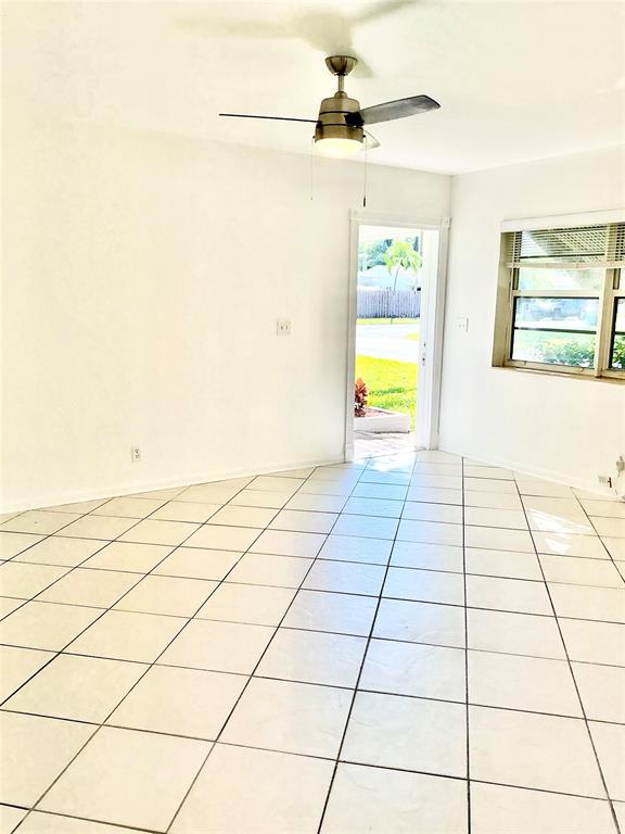 1645 Northeast 12th Street, Unit B Fort Lauderdale, FL 33304 - Photo 8 of 20 a view of a room & utility room