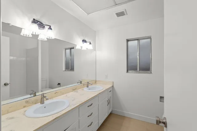 an empty room with a empty space and window