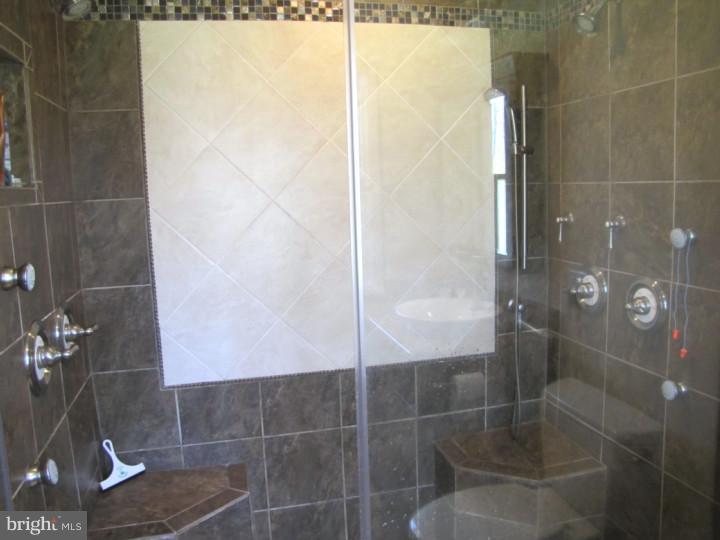 62 Pin Oak Road Skillman, NJ 08558 - Photo 13 of 21 a bathroom with a shower
