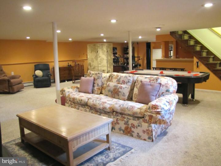 62 Pin Oak Road Skillman, NJ 08558 - Photo 18 of 21 a living room with furniture and a couch