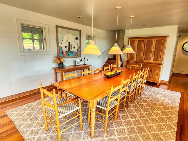 a view of a swimming pool with seating area