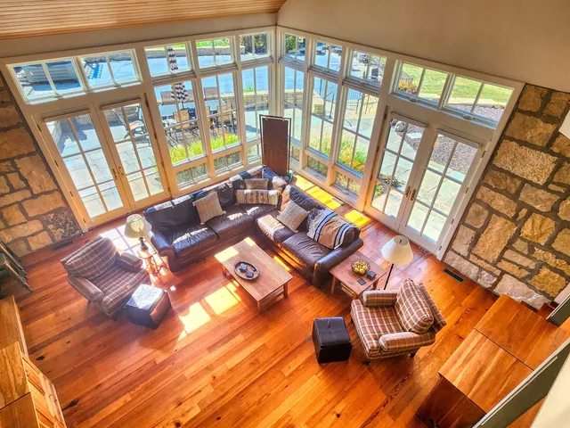 a view of a patio with table and chairs