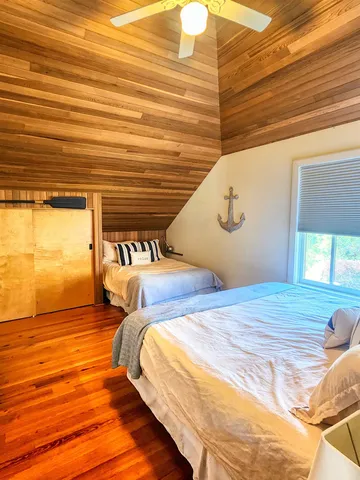 a view of a park with large trees