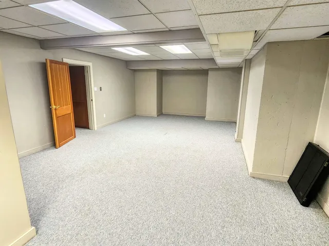 a view of house with yard outdoor seating area and barbeque oven