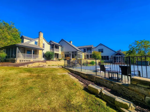 a front view of a house with swimming pool
