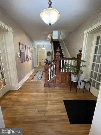 a view of a living room and dining room