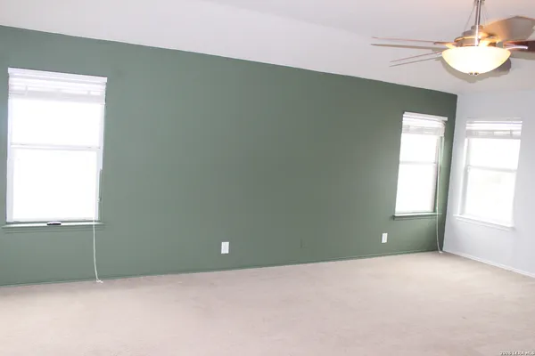 an empty room that has a window