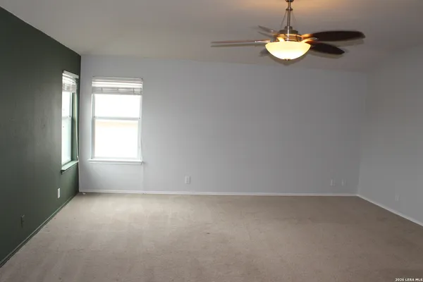 a view of empty room with a window