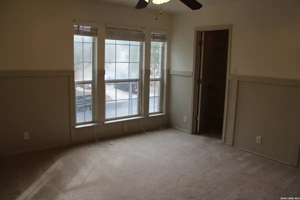 an empty room with windows