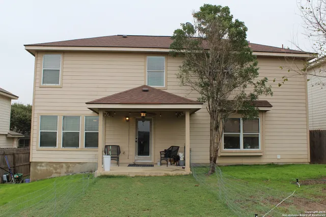 a front view of a house with garage