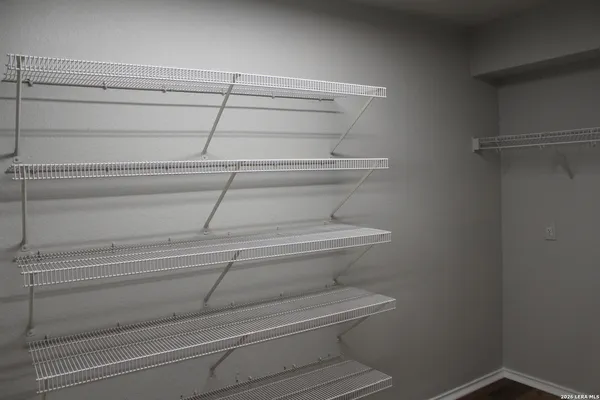 a picture of empty room with wooden floor