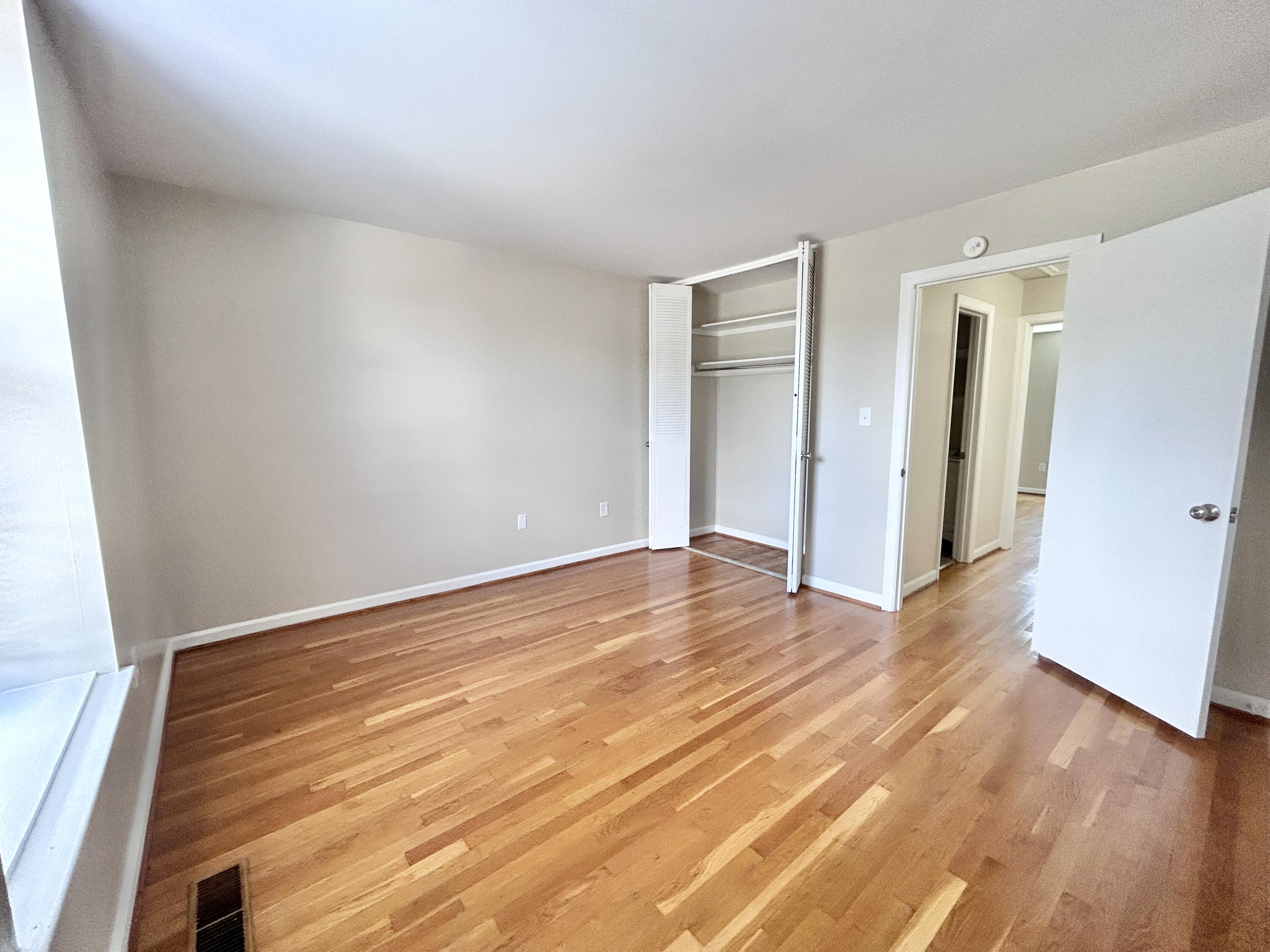 1803 Grandin Road Southwest Roanoke, VA 24015 - Photo 19 of 33 a view of an empty room and wooden floor