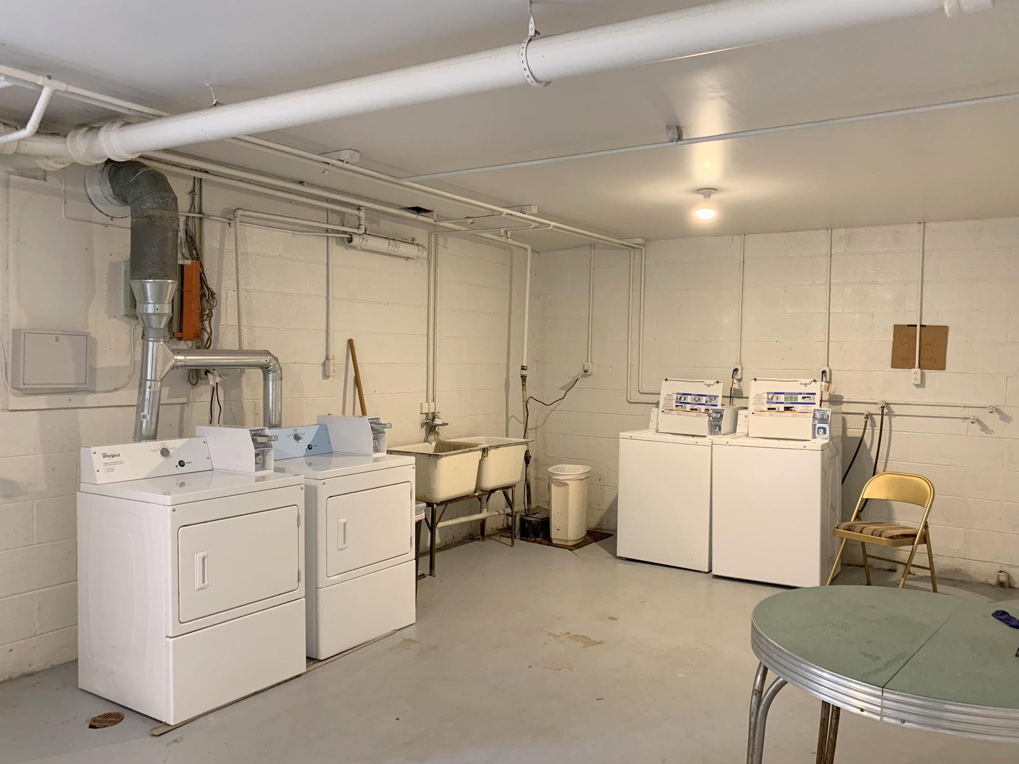 1803 Grandin Road Southwest Roanoke, VA 24015 - Photo 31 of 33 a room with dryer and washer