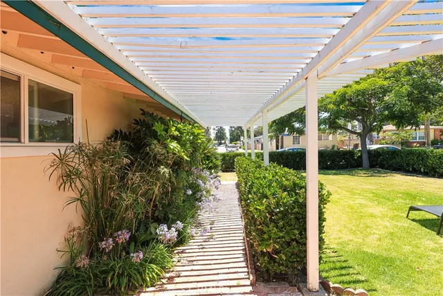 a front view of a house with a sitting area