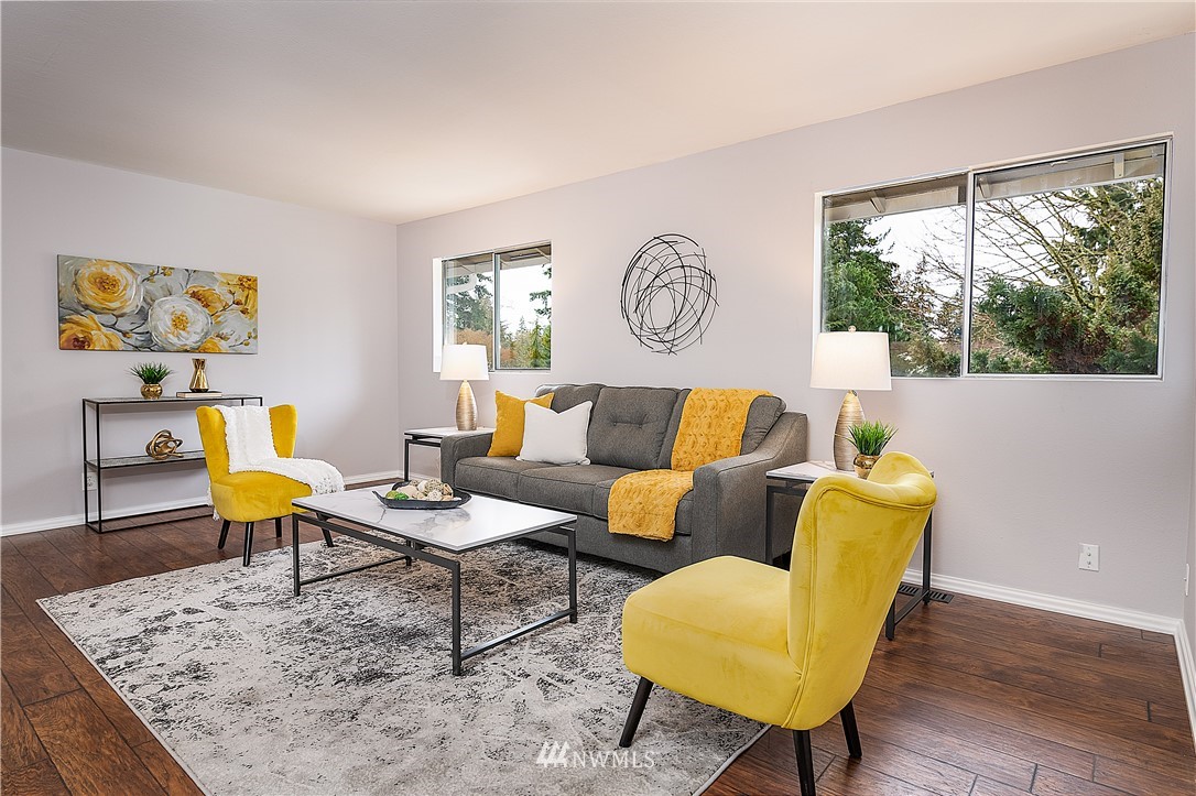 21723 2nd Avenue Southeast Bothell, WA 98021 - Photo 12 of 27 a living room with furniture and a large window