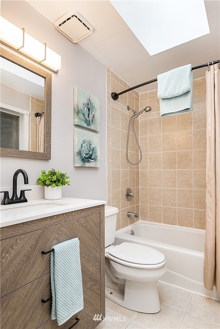 21723 2nd Avenue Southeast Bothell, WA 98021 - Photo 20 of 27 a bathroom with a sink a toilet and a bathtub