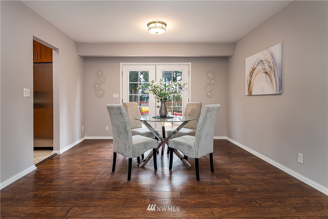 21723 2nd Avenue Southeast Bothell, WA 98021 - Photo 9 of 27 a dining room with furniture and window