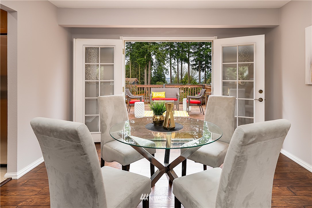 21723 2nd Avenue Southeast Bothell, WA 98021 - Photo 10 of 27 a dining room with furniture window and outside view