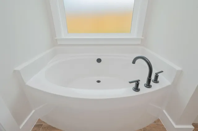 a bathroom with a bathtub