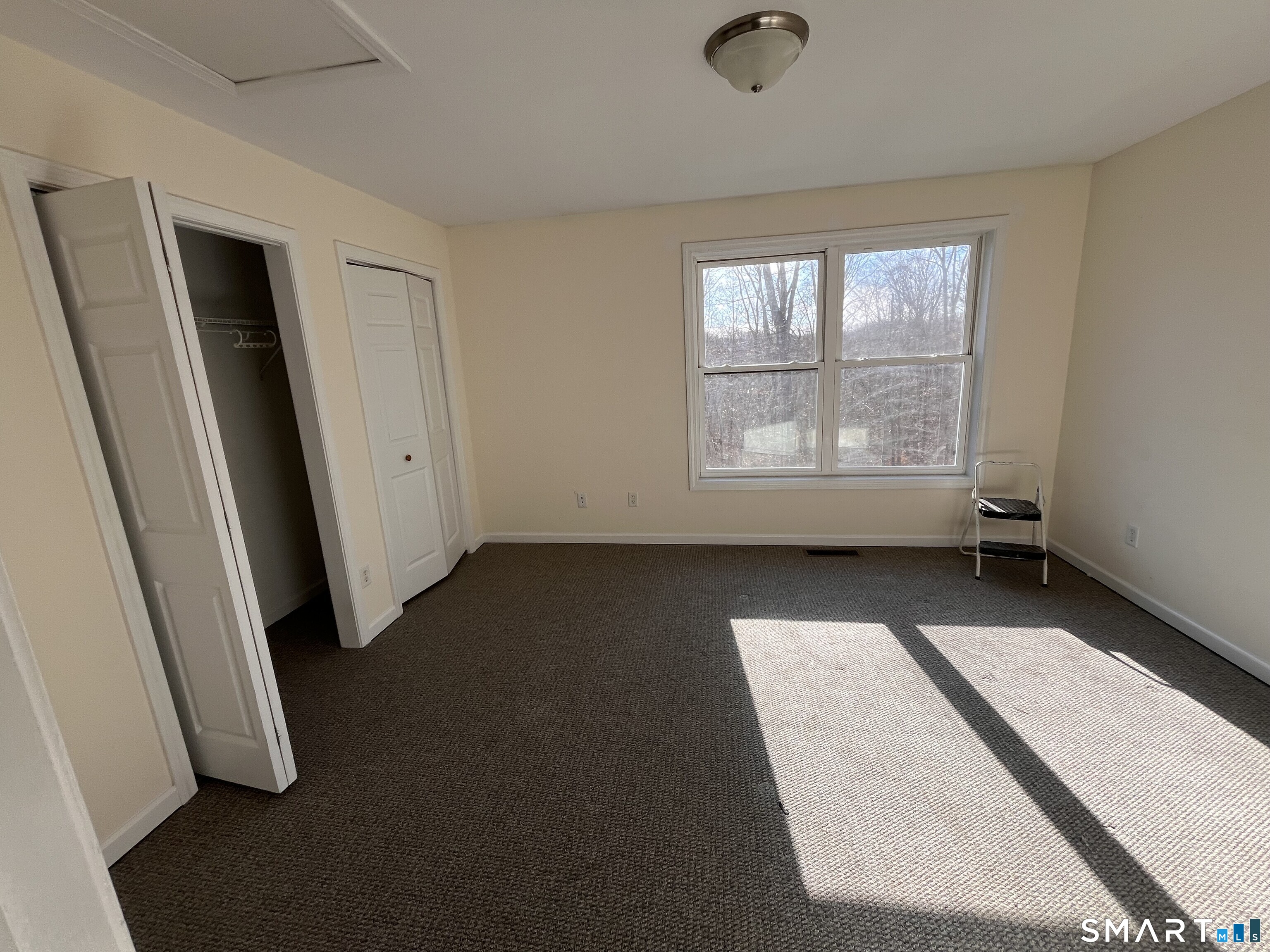 2470 Boston Post Road, Unit 3 Guilford, CT 06437 - Photo 2 of 4 an empty room with windows