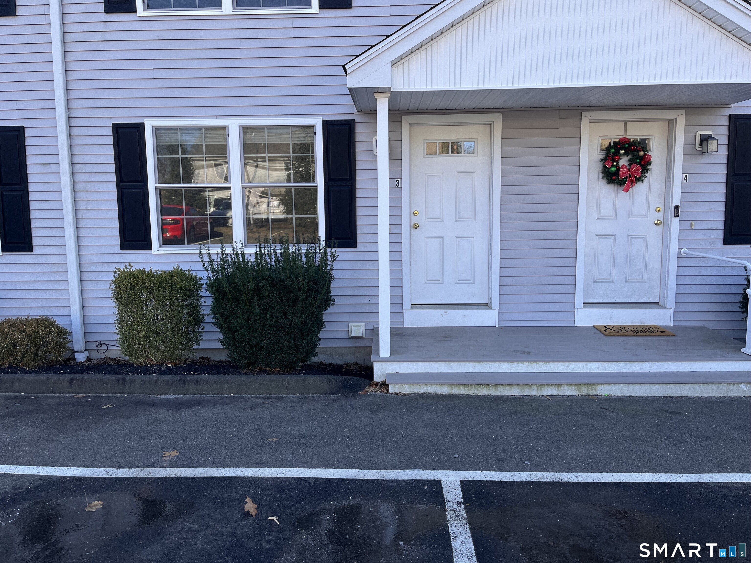 2470 Boston Post Road, Unit 3 Guilford, CT 06437 - Photo 4 of 4 a front view of a house