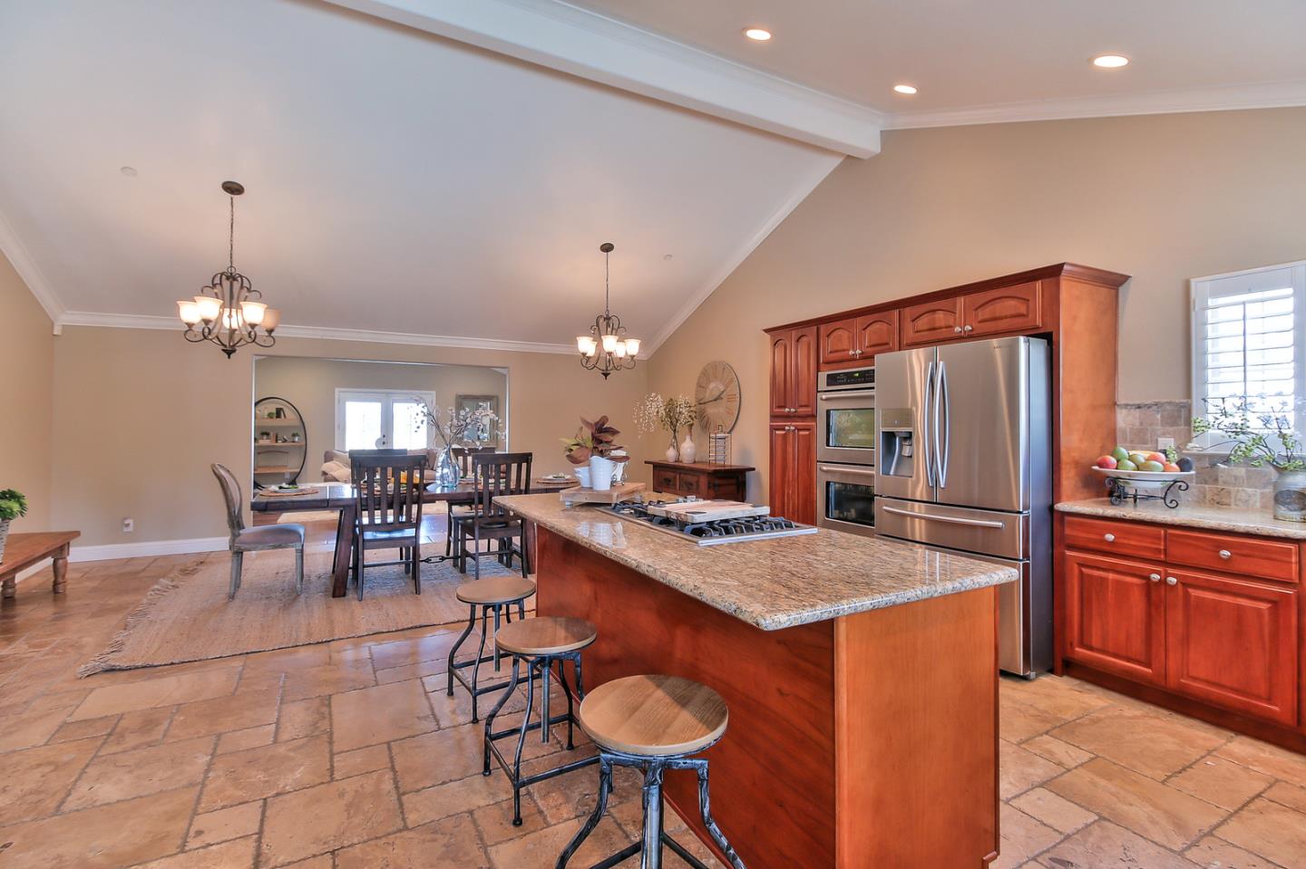 10415 New Avenue Gilroy, CA 95020 - Photo 13 of 55 a kitchen with stainless steel appliances granite countertop a sink a stove and a refrigerator