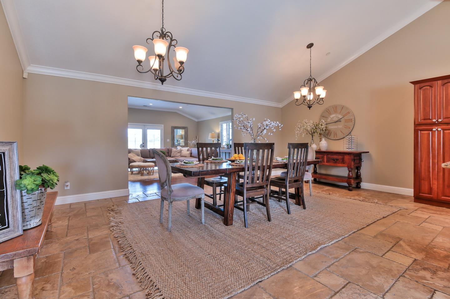 10415 New Avenue Gilroy, CA 95020 - Photo 14 of 55 a view of a dining room with furniture and chandelier