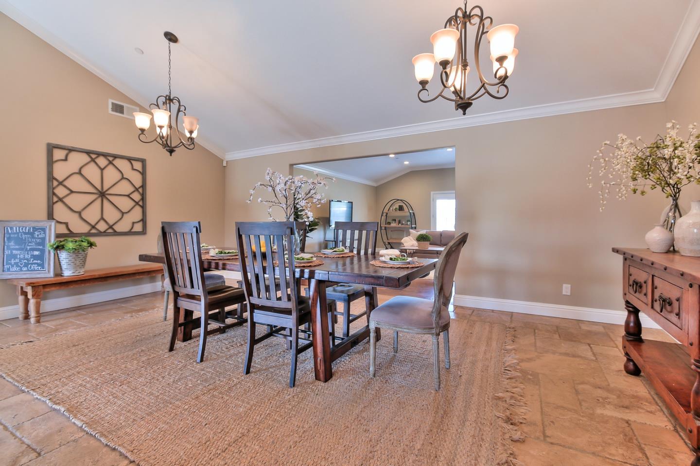 10415 New Avenue Gilroy, CA 95020 - Photo 15 of 55 a dining room with wooden floor a chandelier a wooden table and chairs
