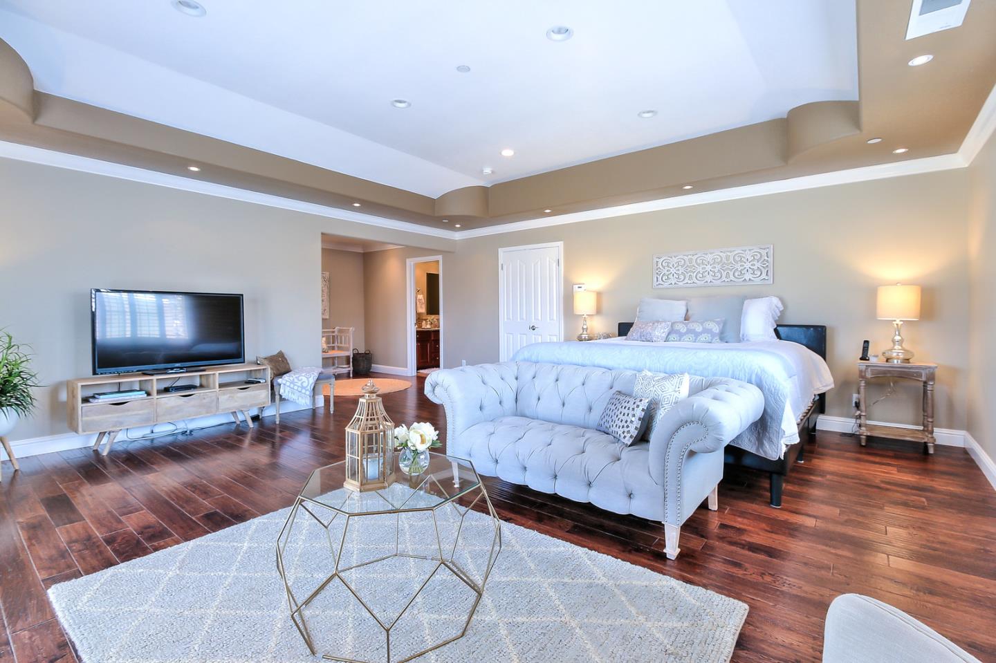 10415 New Avenue Gilroy, CA 95020 - Photo 19 of 55 a bedroom with a bed and a flat screen television