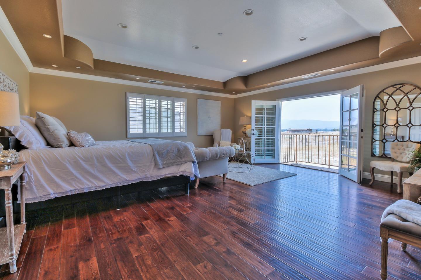 10415 New Avenue Gilroy, CA 95020 - Photo 22 of 55 a living room with furniture and a wooden floor
