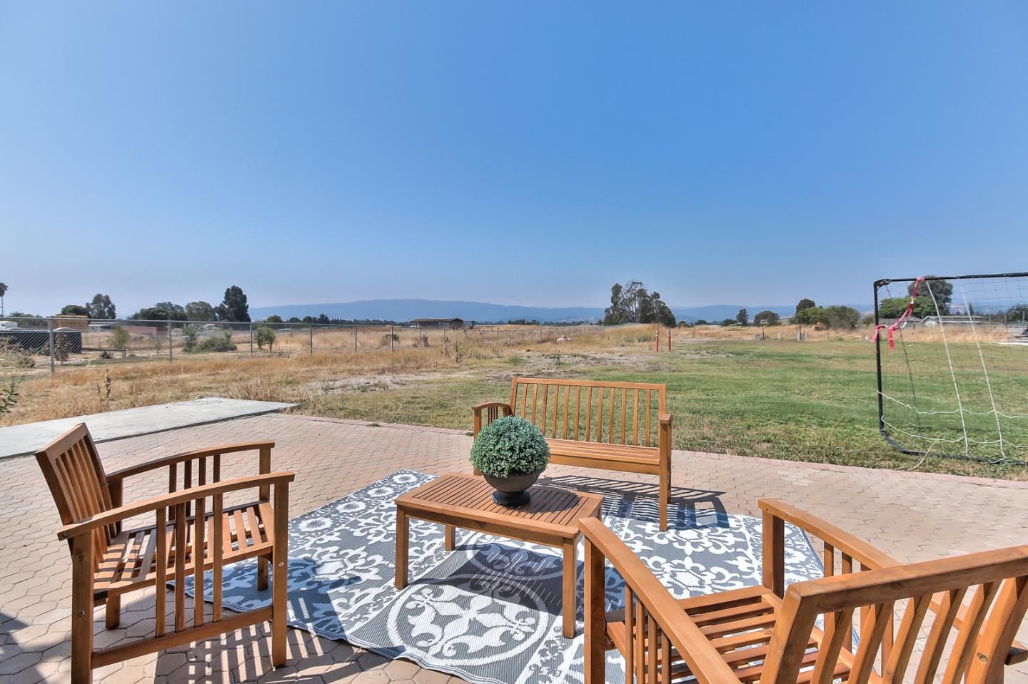 10415 New Avenue Gilroy, CA 95020 - Photo 32 of 55 a terrace with outdoor seating and city view