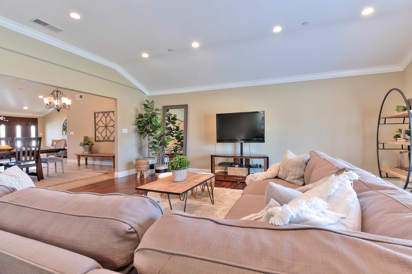 10415 New Avenue Gilroy, CA 95020 - Photo 6 of 55 a living room with furniture and a flat screen tv