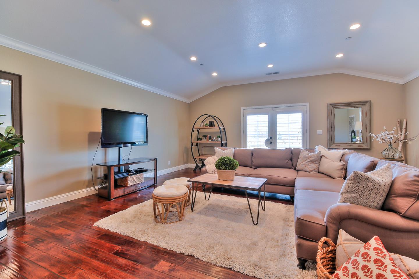 10415 New Avenue Gilroy, CA 95020 - Photo 8 of 55 a living room with furniture and a flat screen tv