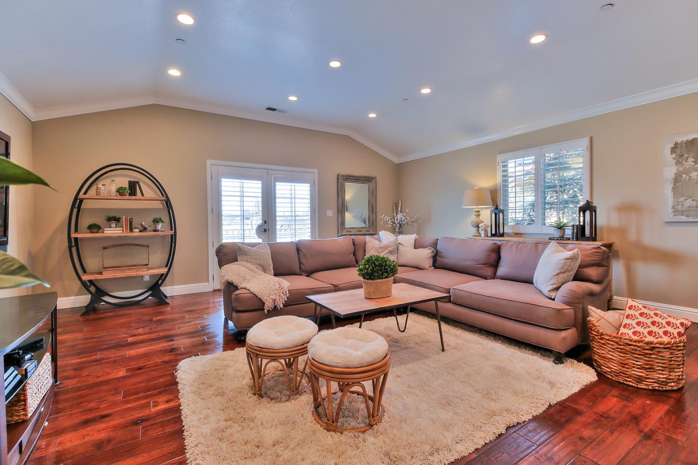 10415 New Avenue Gilroy, CA 95020 - Photo 9 of 55 a living room with furniture a rug and a window