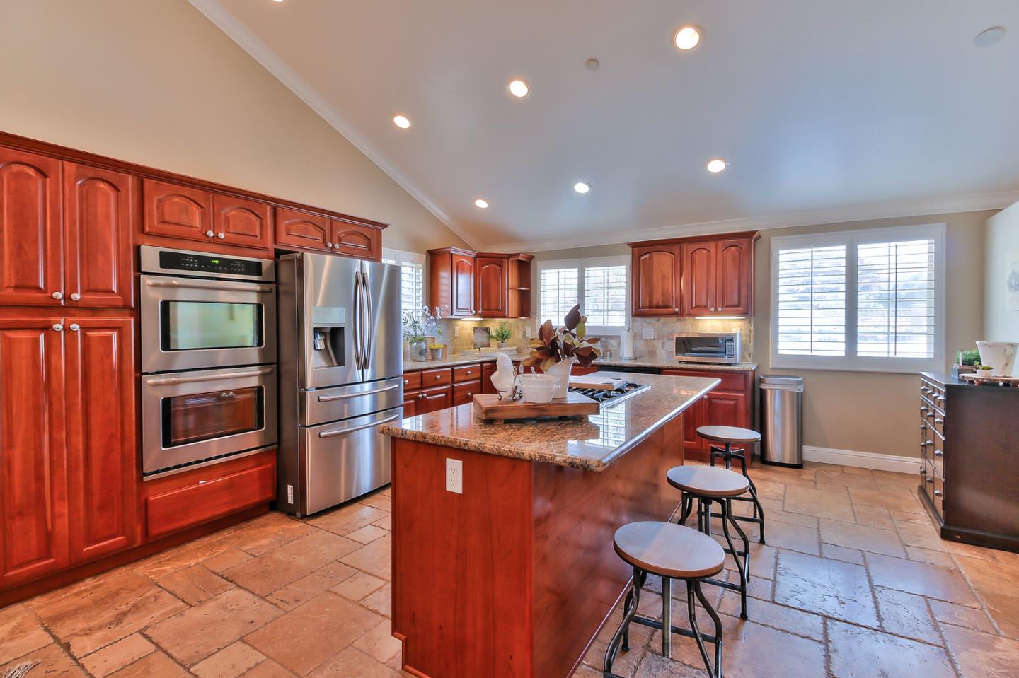 10415 New Avenue Gilroy, CA 95020 - Photo 10 of 55 a kitchen with stainless steel appliances granite countertop a refrigerator a sink dishwasher and a stove with wooden floor