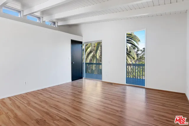 a kitchen with stainless steel appliances a sink stove and refrigerator