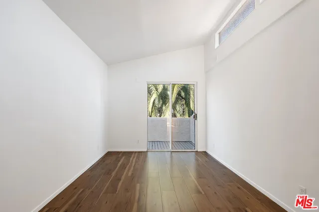 a view of a trees in front of a house