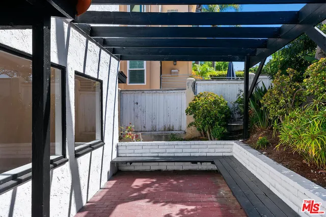 a front view of a house with a glass door